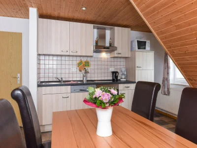 Apartment Große Ferienwohnung im Dachgeschoss in Bensersiel - Features photo 17