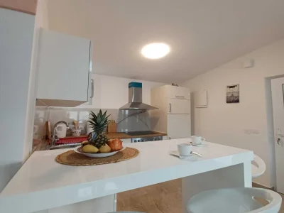 Apartment Beachfront Apartment with Balcony and Sea View - Features photo 7