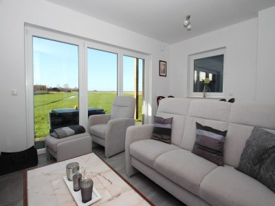 Holiday house Ferienwohnung mit Sauna in Tossens - Features photo 9