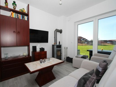 Holiday house Ferienwohnung mit Sauna in Tossens - Features photo 13