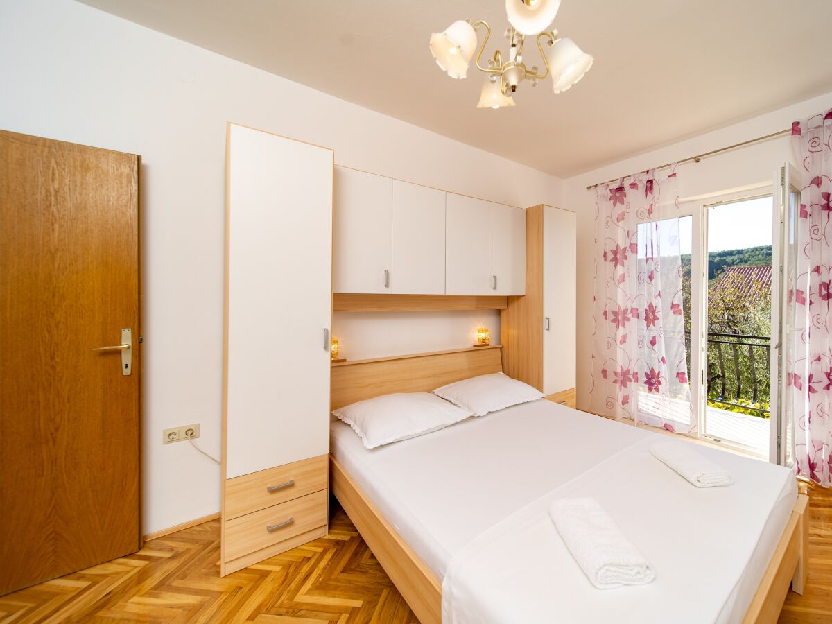 Apartment Three bedroom apartment with balcony Lopar, Rab A-24754-b