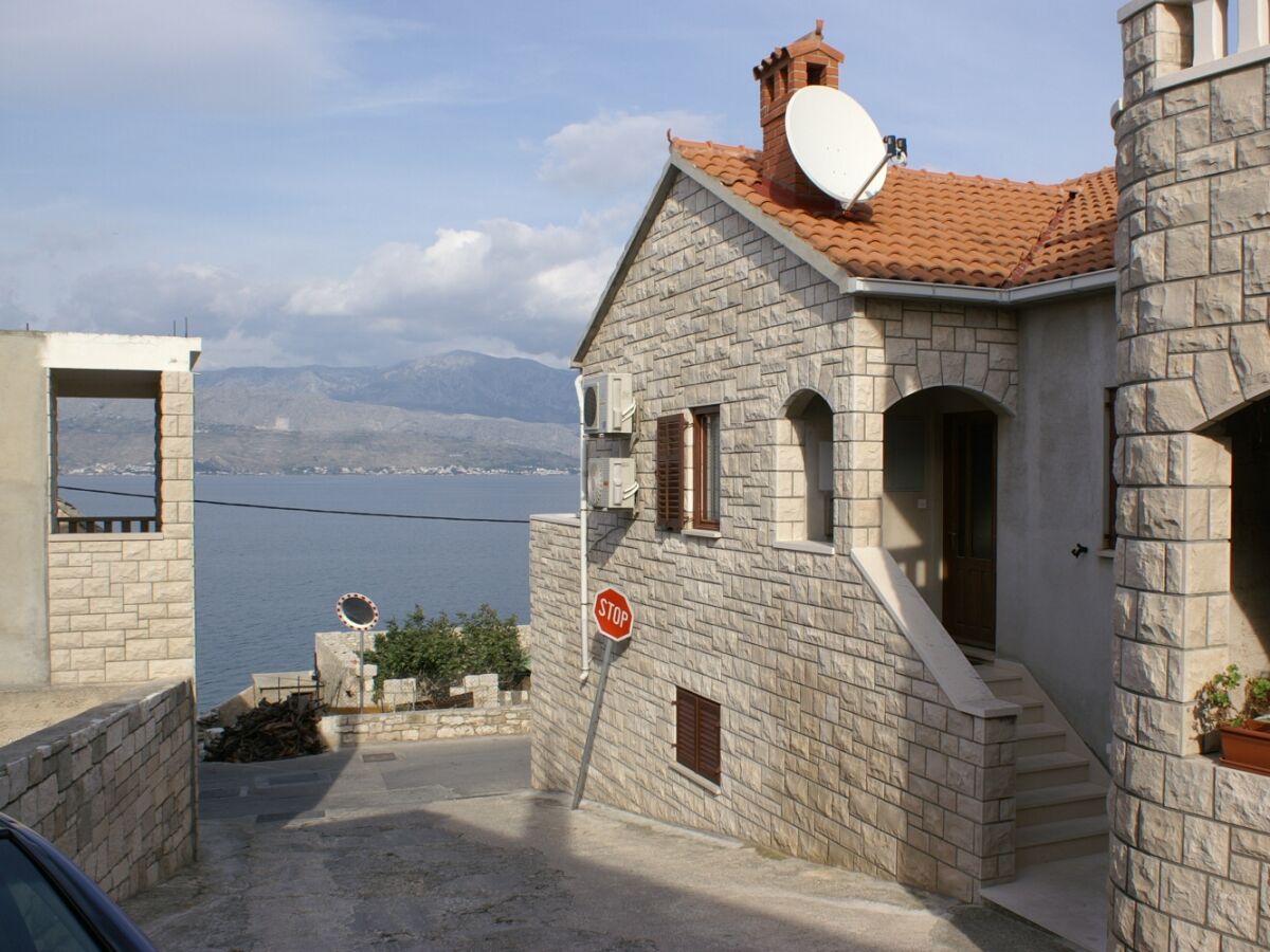 Apartment Two bedroom apartment with terrace and sea view Postira, Brač A-2898-b