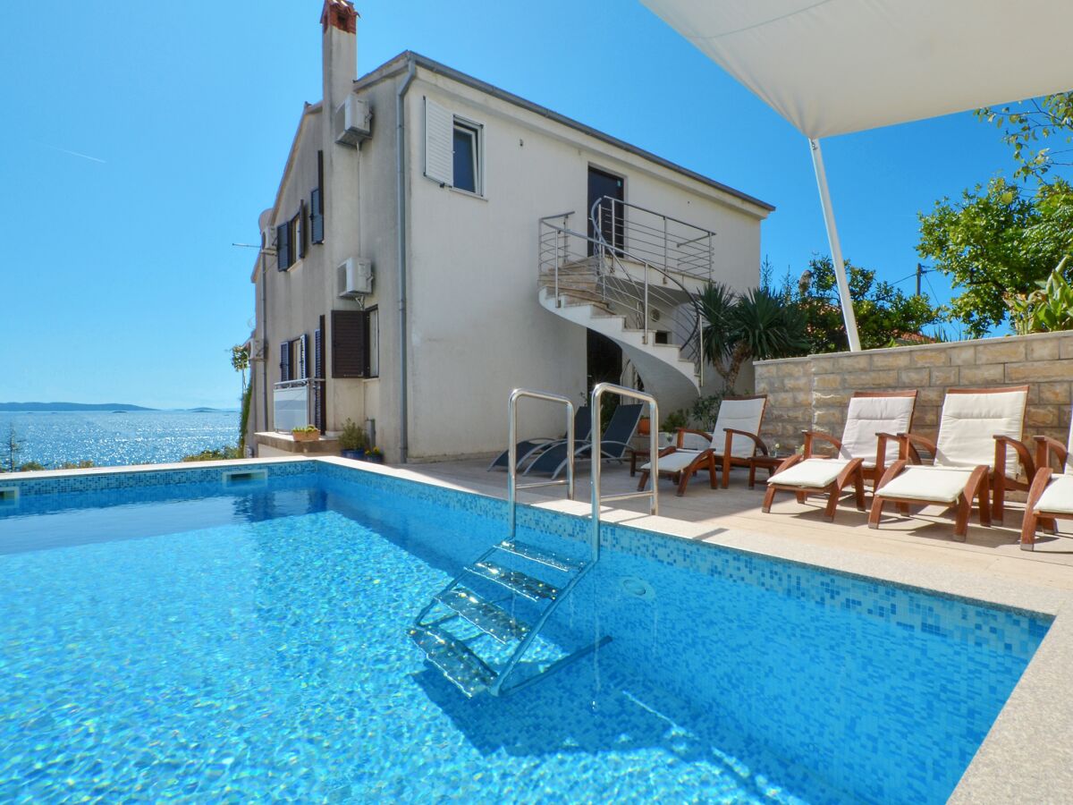 Apartment Two bedroom apartment with terrace and sea view Seget Vranjica, Trogir A-4284-a