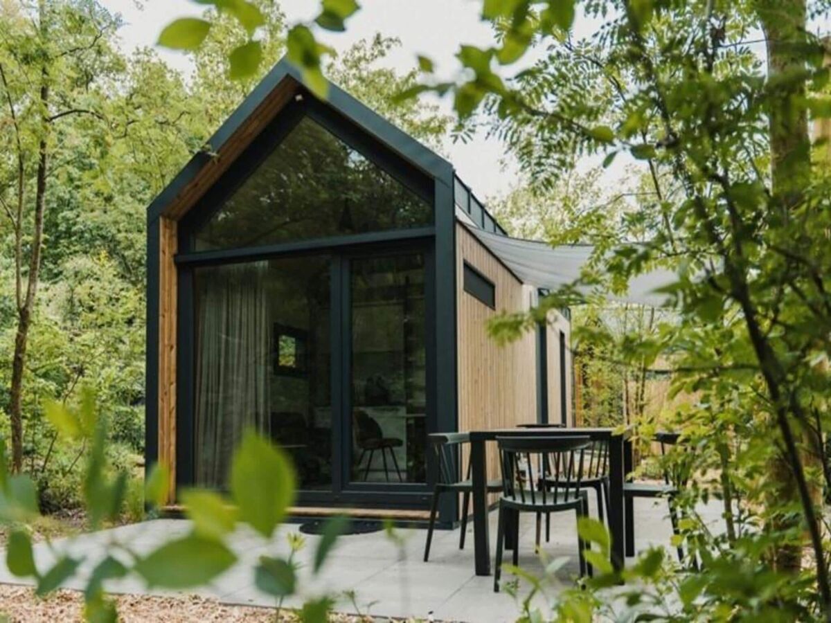 Holiday park 4-Person holiday home in nature