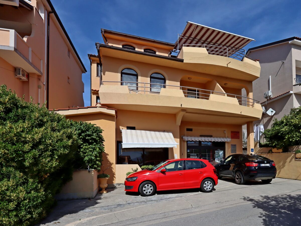 Apartment Two bedroom apartment with terrace and sea view Lopar, Rab A-21808-a