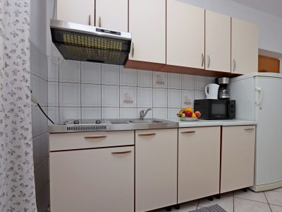 Apartment Two bedroom apartment with balcony and sea view Lopar, Rab A-21808-b - Outdoor photo 13