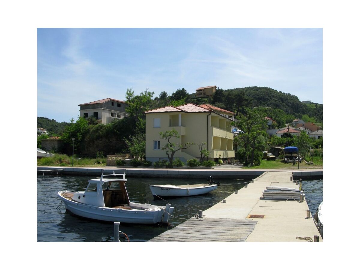 Apartment Two bedroom apartment with balcony and sea view Supetarska Draga - Donja, Rab A-11769-a