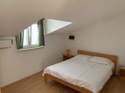 Apartment Two bedroom apartment with terrace and sea view Banjol, Rab A-14134-a - Outdoor photo 12