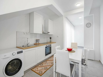 Apartment Wohnung mit Gemeinschaftsgarten in Banjol - Features photo 13