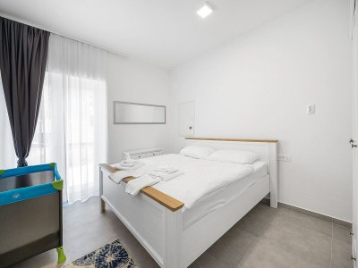 Apartment Wohnung mit Gemeinschaftsgarten in Banjol - Features photo 14