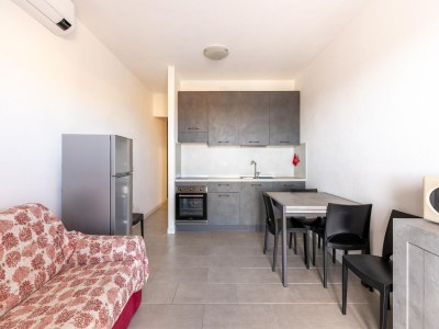 Apartment Air-conditioned, in residence, with pool and patio - Features photo 12