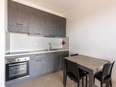 Apartment Air-conditioned, in residence, with pool and patio - Features photo 19