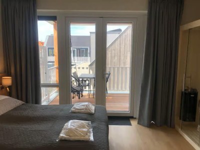 Apartment Lodge mit schönem Blick auf den Garten - Features photo 6