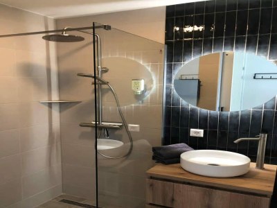 Apartment 2-person lodge on 2nd floor with view of dunes. - Features photo 9