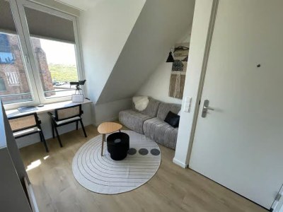 Apartment 2-person lodge on 2nd floor with view of dunes. - Features photo 10