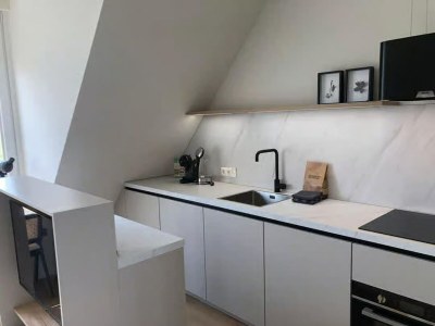 Apartment 2-person lodge on 2nd floor with view of dunes. - Features photo 11