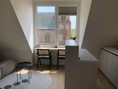 Apartment 2-person lodge on 2nd floor with view of dunes. - Features photo 13