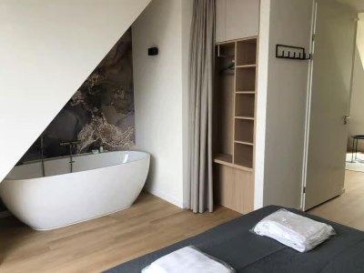 Apartment 2-person lodge on 2nd floor with view of dunes. - Features photo 15