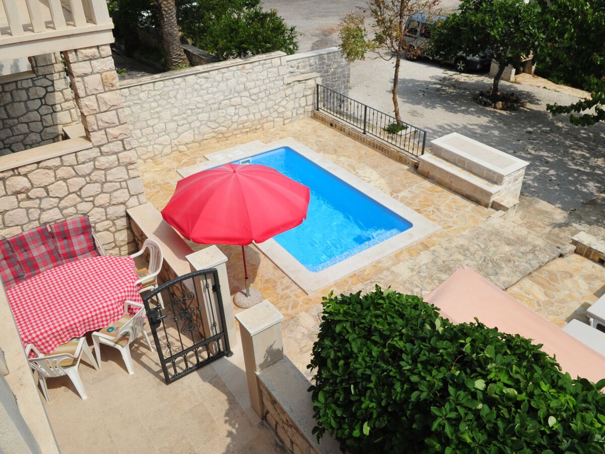 Apartment Three bedroom apartment with terrace and sea view Supetar, Brač A-11360-a