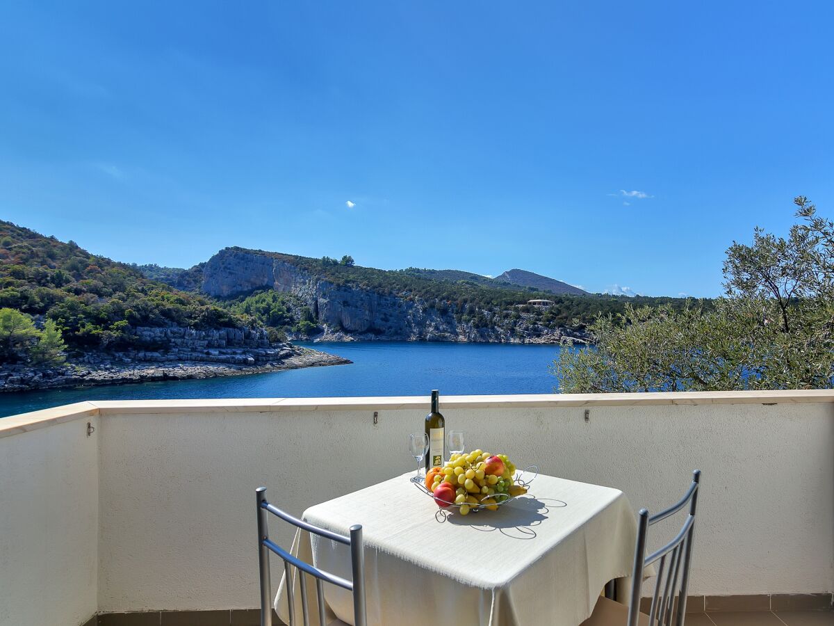 Apartment Studio flat near beach Cove Pokrivenik, Hvar AS-5231-a