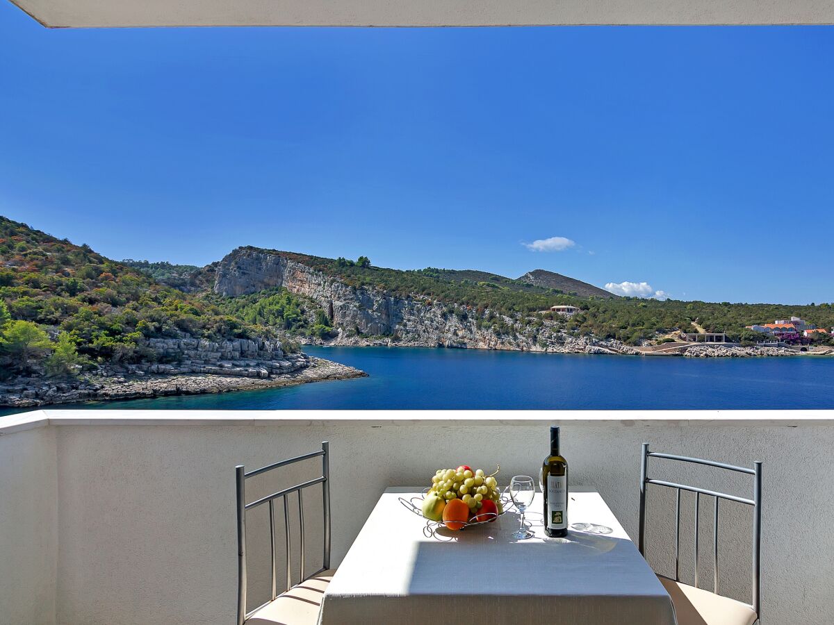Apartment Studio flat near beach Cove Pokrivenik, Hvar AS-5231-b