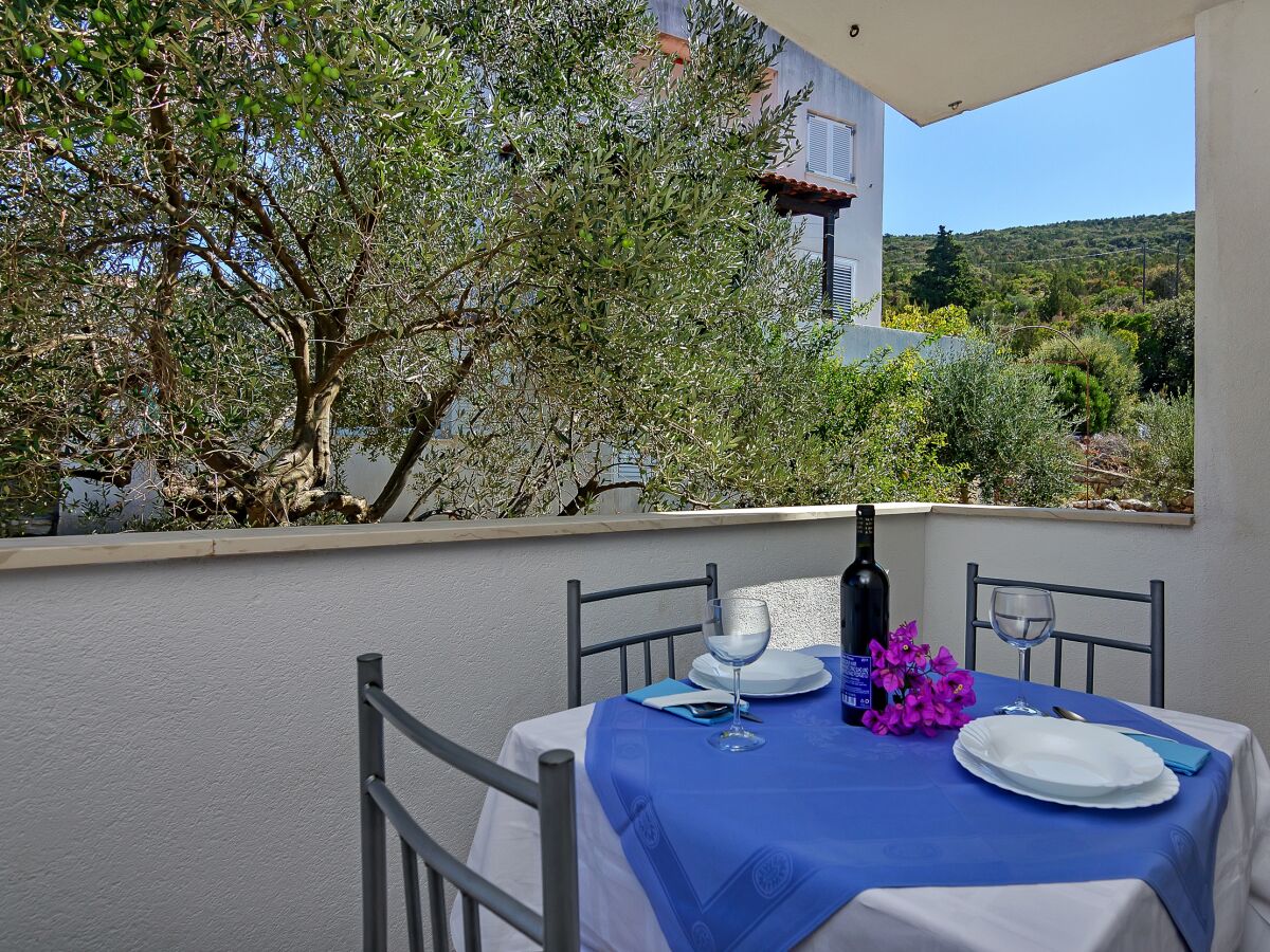 Apartment Studio flat near beach Cove Pokrivenik, Hvar AS-5231-c