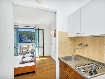 Apartment Studio flat near beach Cove Pokrivenik, Hvar AS-5231-d - Outdoor photo 9