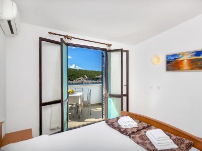 Apartment Studio flat near beach Cove Pokrivenik, Hvar AS-5231-d - Outdoor photo 13