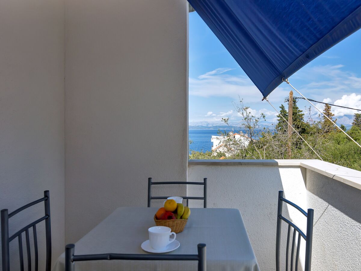Apartment Studio flat near beach Cove Pokrivenik, Hvar AS-5231-e