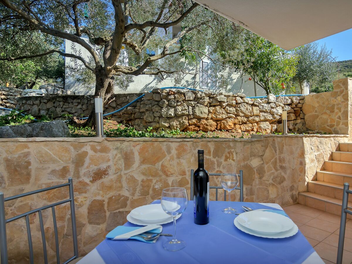 Apartment Studio flat near beach Cove Pokrivenik, Hvar AS-5231-f