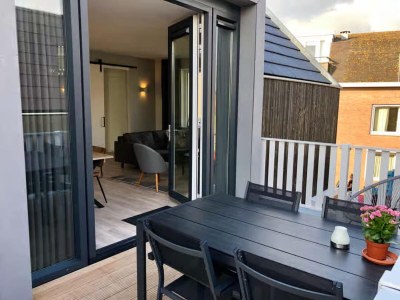 Apartment Lodge with view of the church and dunes - Outdoor photo 3