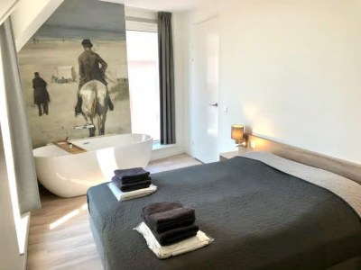 Apartment Lodge with view of the church and dunes - Features photo 7