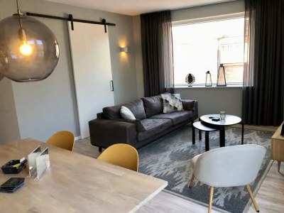 Apartment Lodge with view of the church and dunes - Features photo 9