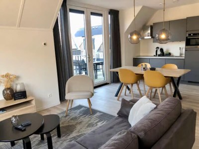 Apartment Lodge with view of the church and dunes - Features photo 11