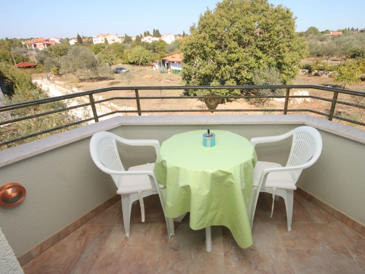 Apartment Studio flat with terrace and sea view Fažana AS-7252-a