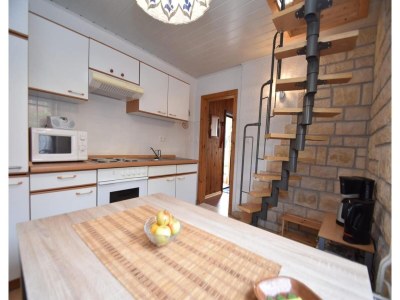 Apartment Gemütliches Ferienhaus mit Pool in Blankenburg - Features photo 21