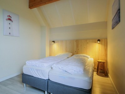 Holiday house Spacious holiday home in Julianadorp - Features photo 16