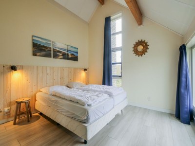 Holiday house Spacious holiday home in Julianadorp - Features photo 17