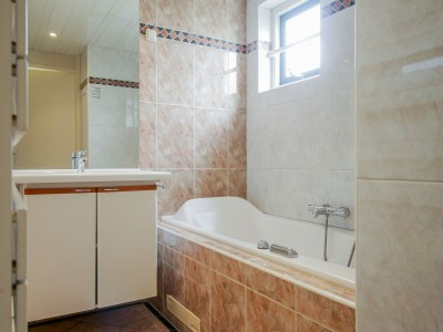 Holiday house Spacious holiday home in Julianadorp - Features photo 20