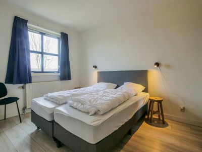 Holiday house Spacious holiday home in Julianadorp - Features photo 21