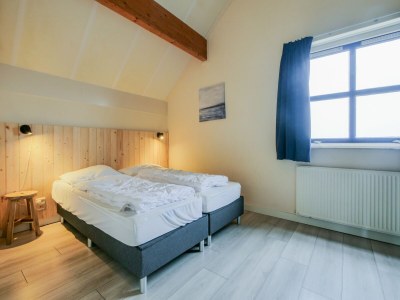 Holiday house Spacious holiday home in Julianadorp - Features photo 24