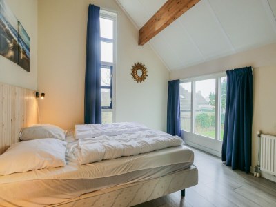 Holiday house Spacious holiday home in Julianadorp - Features photo 27