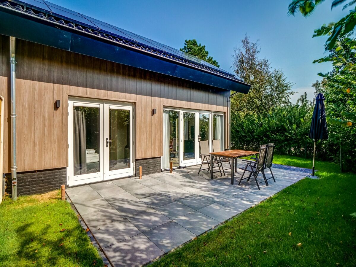 Holiday house Modern holiday home on Dutch coast with garden - Outdoor photo 4