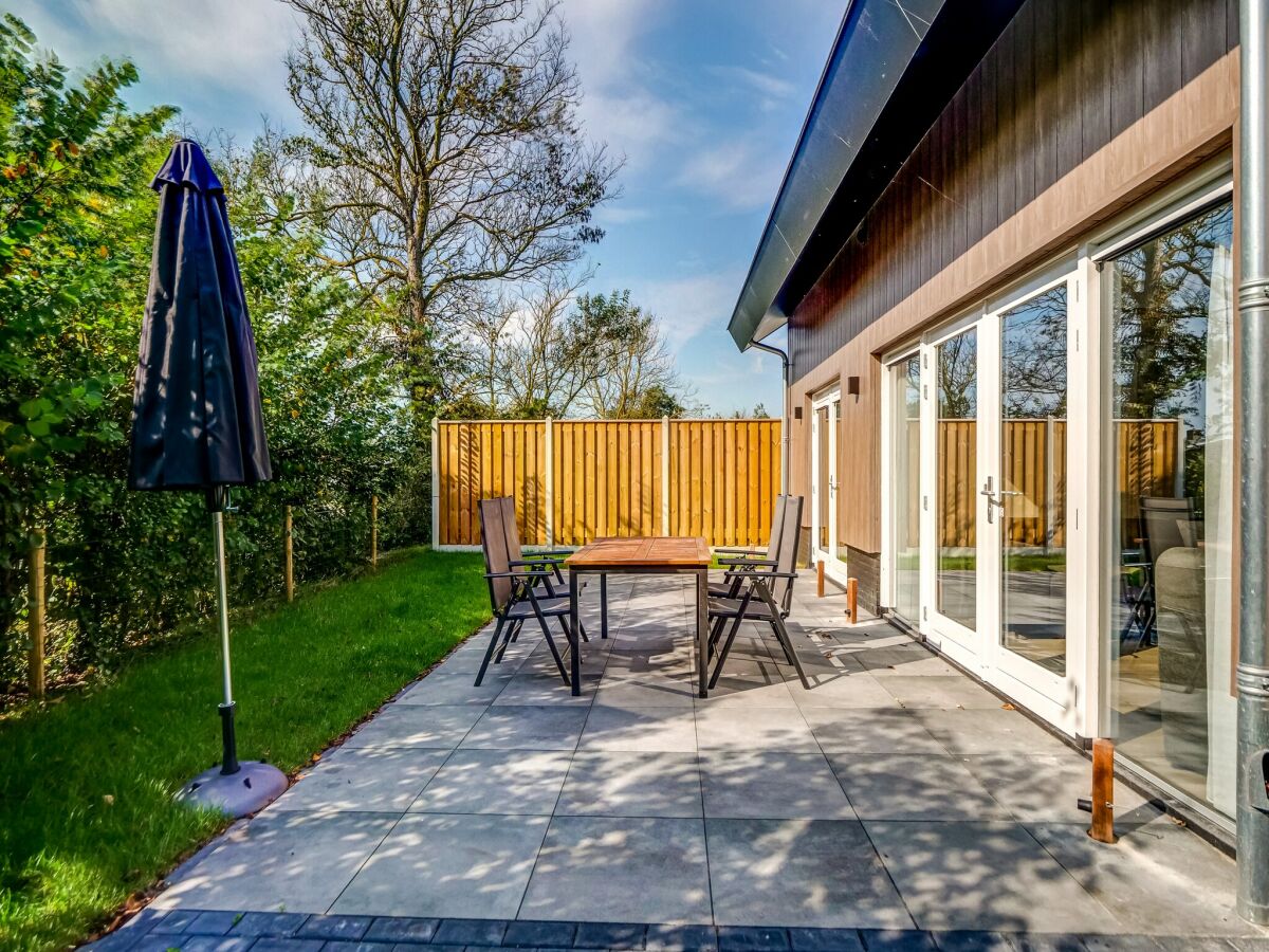 Holiday house Modern holiday home on Dutch coast with garden - Outdoor photo 5