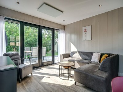 Holiday house Modern holiday home on Dutch coast with garden - Features photo 7