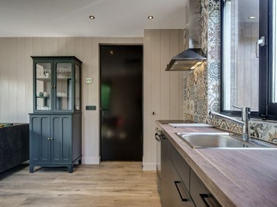 Holiday house Modern holiday home on Dutch coast with garden - Features photo 19