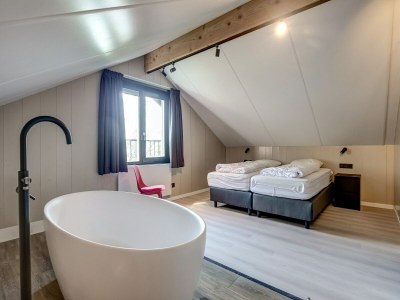 Holiday house Modern holiday home on Dutch coast with garden - Features photo 24