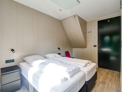 Holiday house Modern holiday home on Dutch coast with garden - Features photo 26