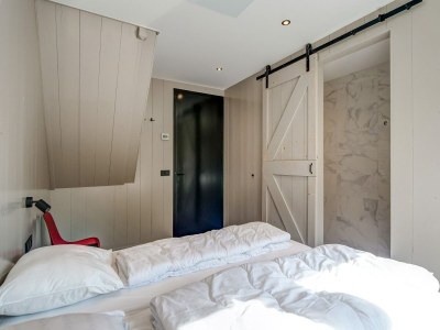 Holiday house Modern holiday home on Dutch coast with garden - Features photo 27