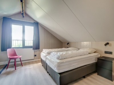 Holiday house Modern holiday home on Dutch coast with garden - Features photo 29